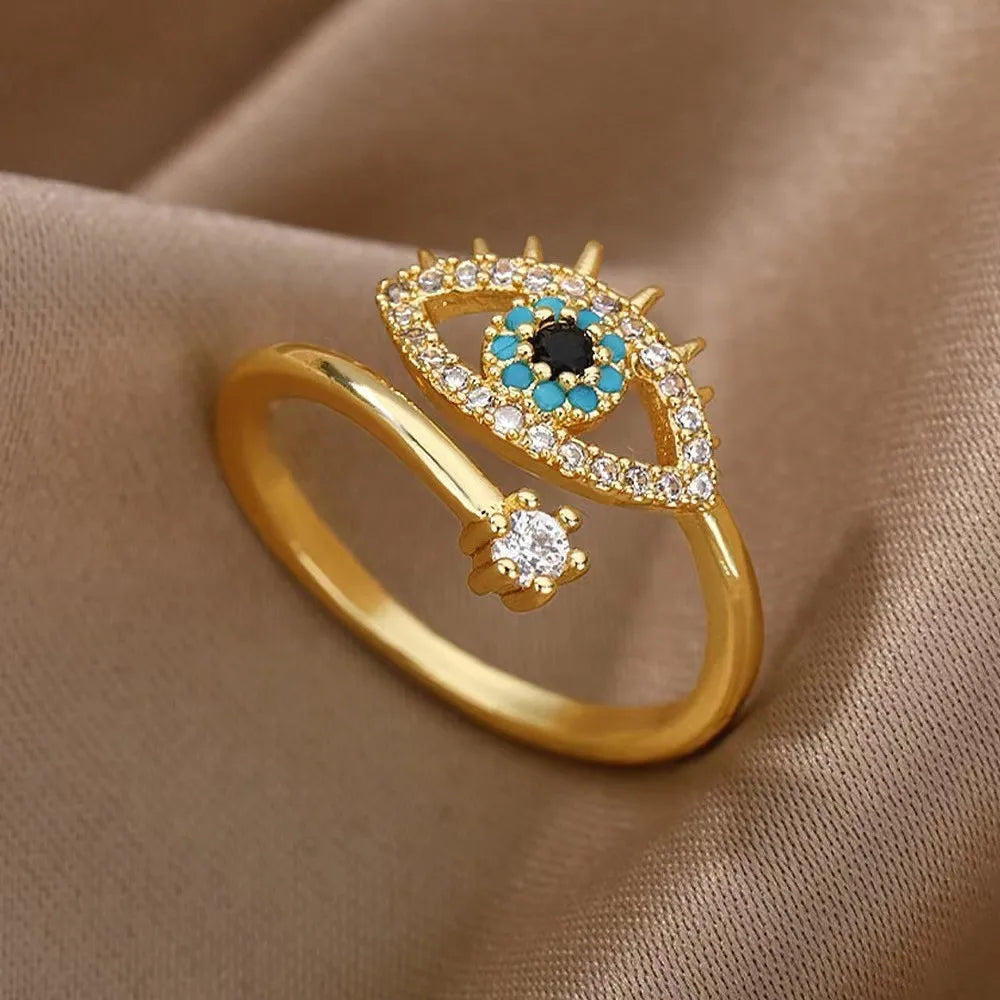 Gold and silver open eye rings